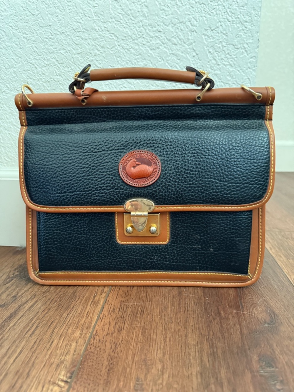 Dooney & Bourke Black and Brown Leather Satchel with Gold Hardware